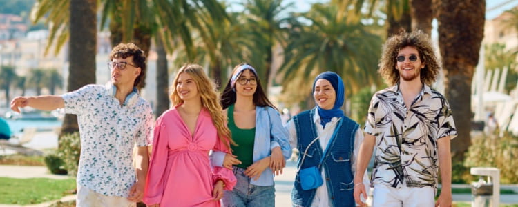 Tourists walking down a street in Little Havana